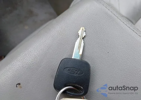 2002 Lincoln Town Car Executive из США, поврежденный, VIN 1LNHM81W52Y671124